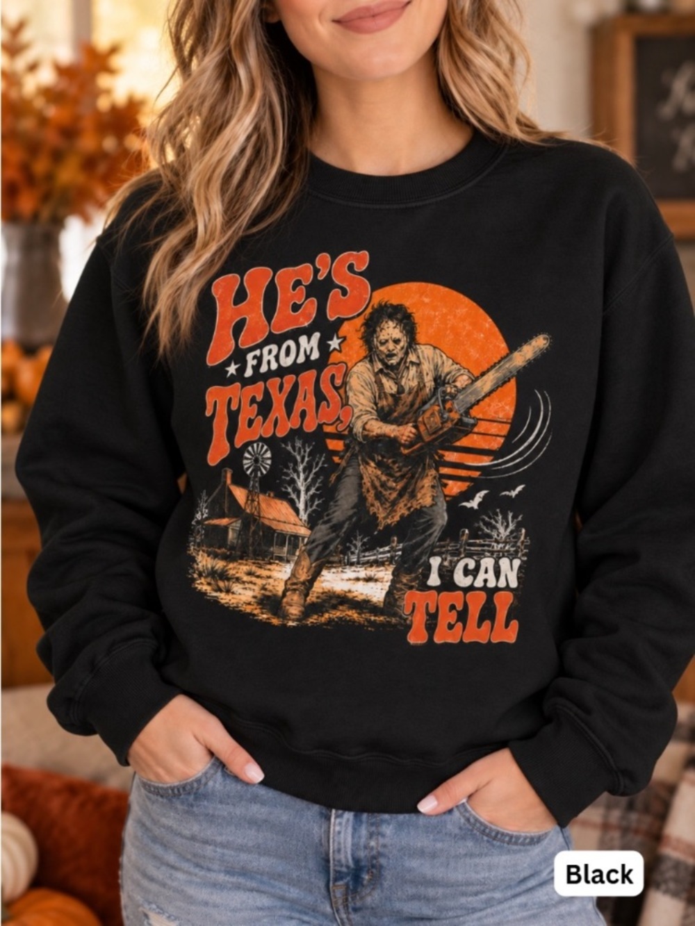 Black Graphic Sweatshirt with Orange and Cream Horror Illustration